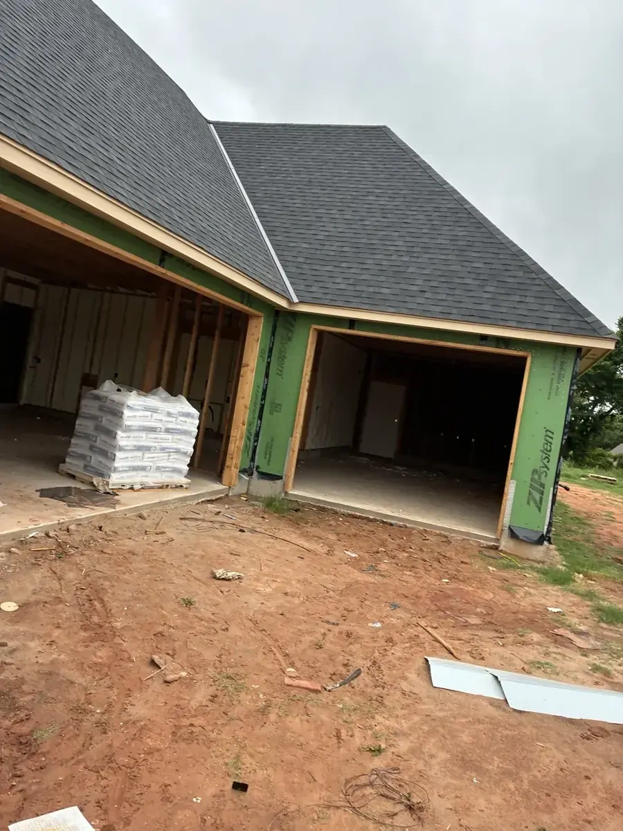 New construction lumber debris before haul-off by Trash Wrangler Junk Removal in Oklahoma City