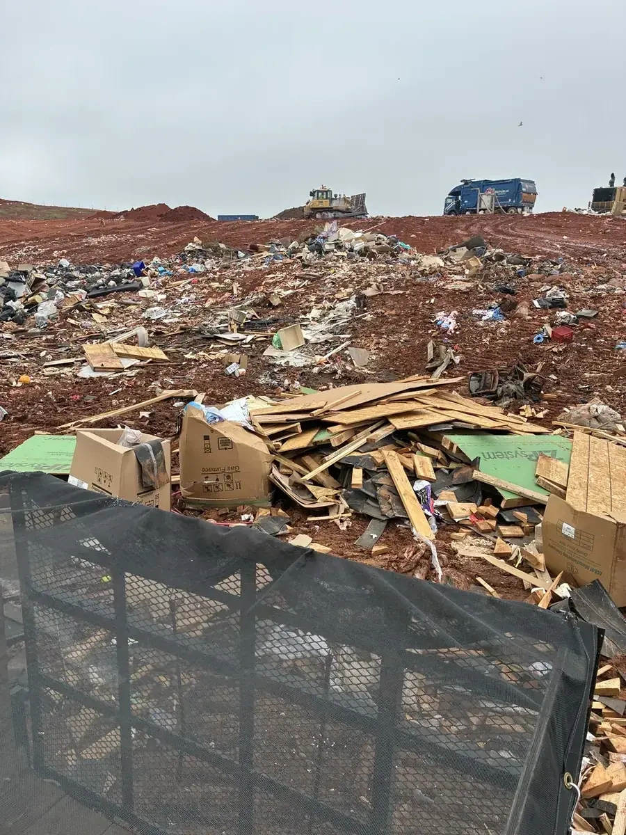 Trash Wrangler junk removal in Moore, OK — a load being dropped at the transfer station